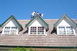 Roof impressions cleaning and repairing a house in Sydney
